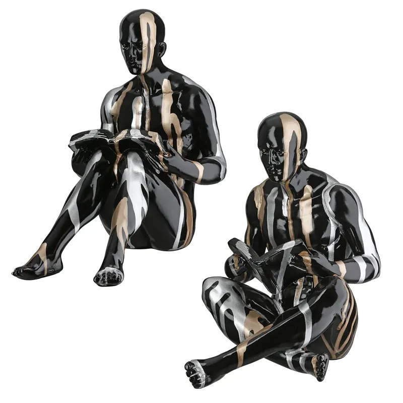Solange Der Vorrat Reicht Buchstützen – Personenform, Schwarze Metalloptik, Silberne Linien, Höhe 22,5 cm - Drip | Gilde